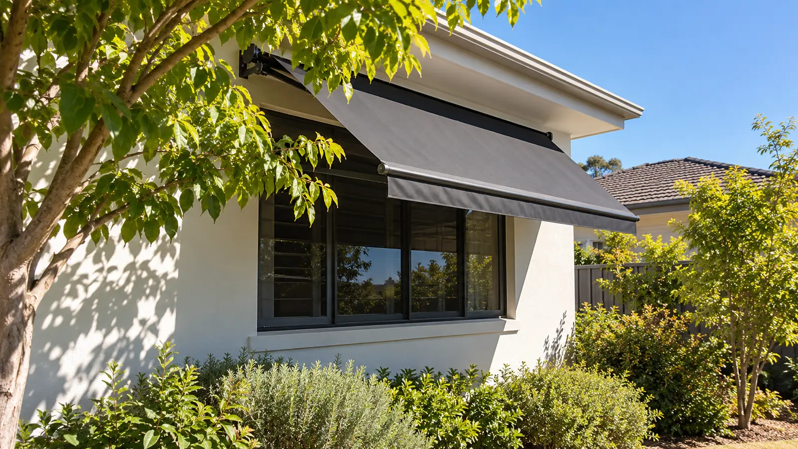 External awning shading a home window from strong summer sun